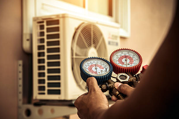 Professional Air Conditioning Service technician working in West Park, NJ